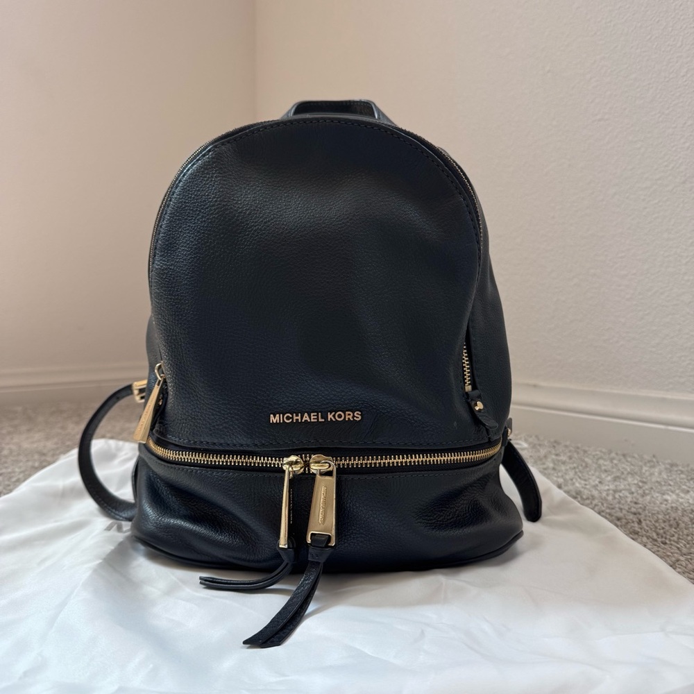 Michael Kors Dark Blue Rhea Backpack with Gold Accents